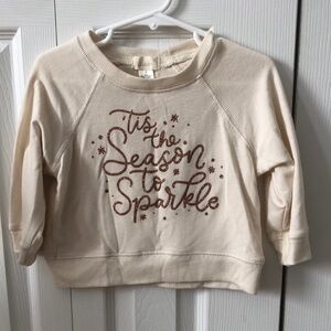 Cozy Cream Sweater with Festive Sparkle Design